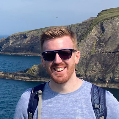 Site author profile picture. White male, mid thirties wearing sunglasses with cliffs in the background.